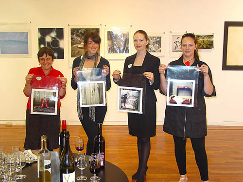 Lynn Houghton photograph: PhotoForum’s porters line up with Abby Storey’s photographs at PhotoForum Fund-raising Auction held at Peter Webb Galleries, Auckland, on Tuesday 21 April 2009. Left to right: Jan Young, Roberta Thornley, Vicki Empson, and Leigh Bell.